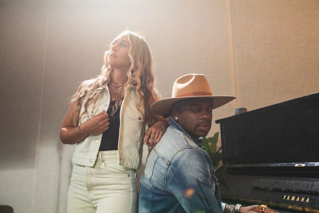 Ashley Cooke and Jimmie Allen at a piano