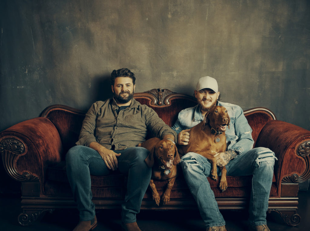 Pryor & Lee with their dogs.